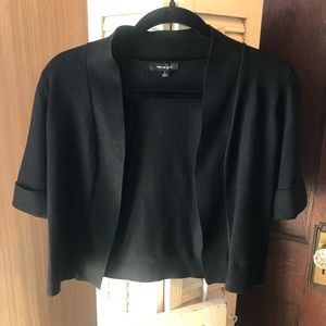 Never worn black Verve Amí shrug, size small, decorative button detail on sleeve